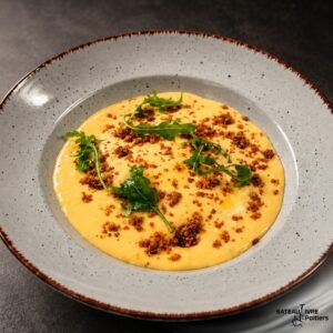 Parmentier de canard à la patate douce, piperade et streusel noisette